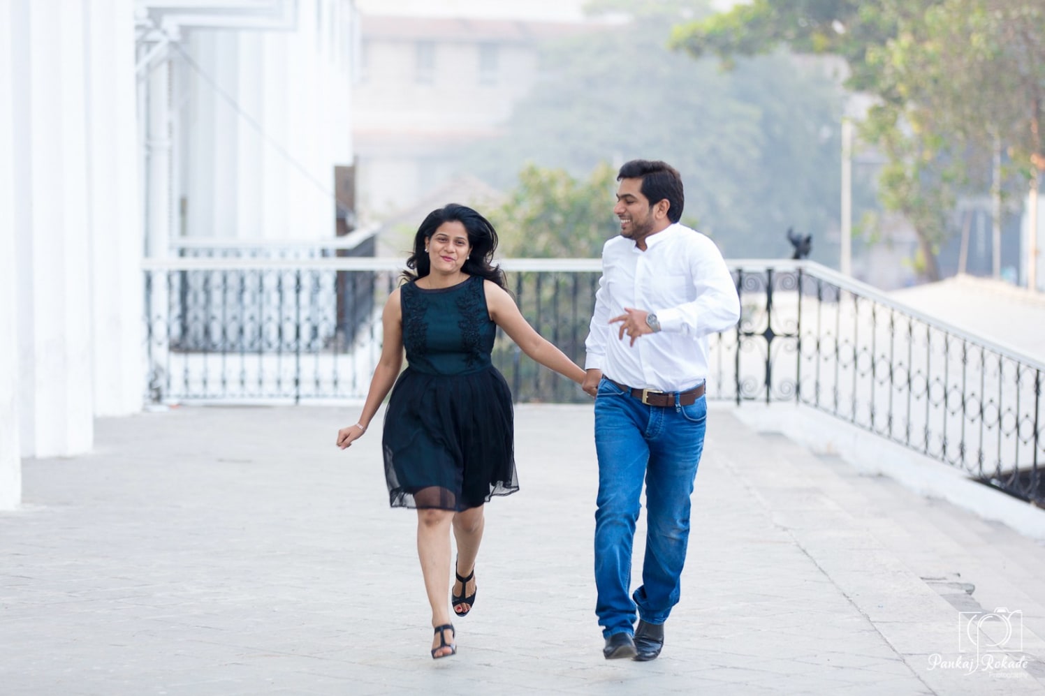 A candid running picture of the couple by Pankaj Rokade Photography Wedding-photography | Weddings Photos & Ideas