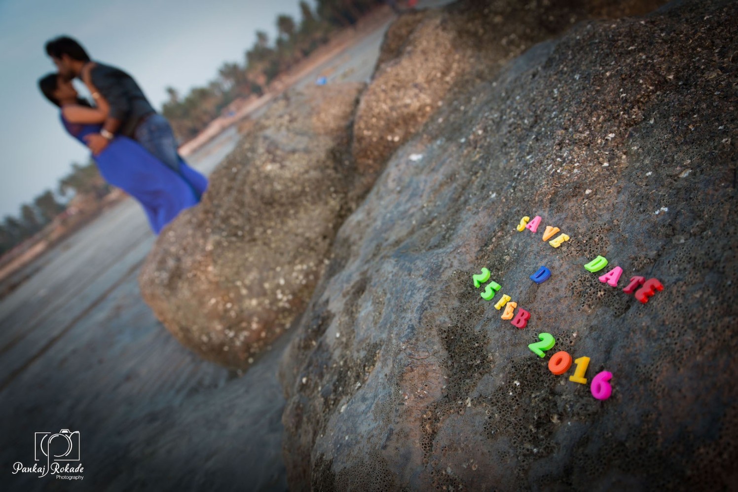 A sweet save the date with the couple in background by Pankaj Rokade Photography Wedding-photography | Weddings Photos & Ideas
