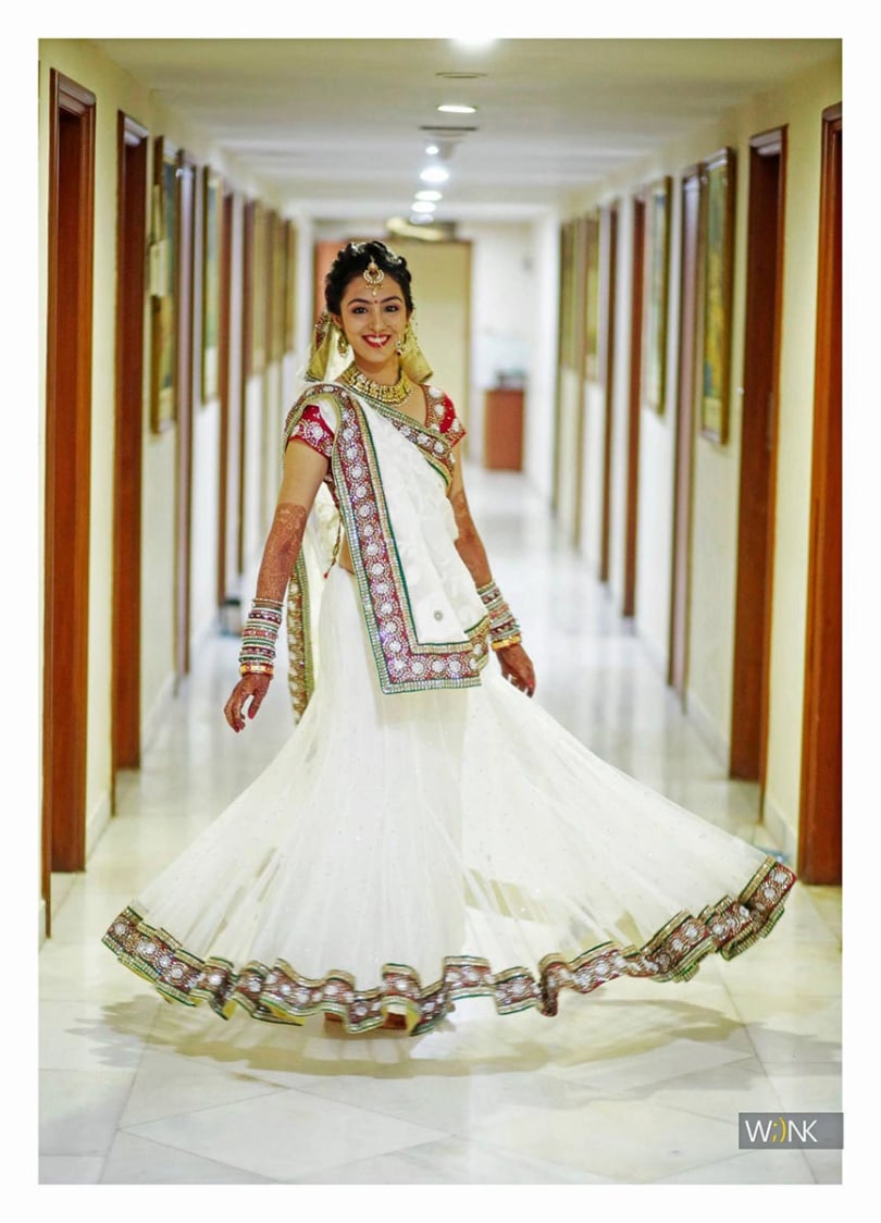 Beautiful bridal pose in white lehenga by Wiink Wedding-photography | Weddings Photos & Ideas