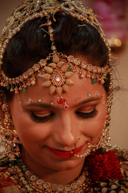 The Gorgeous bride glances down by Saurabh Photography Wedding-photography | Weddings Photos & Ideas