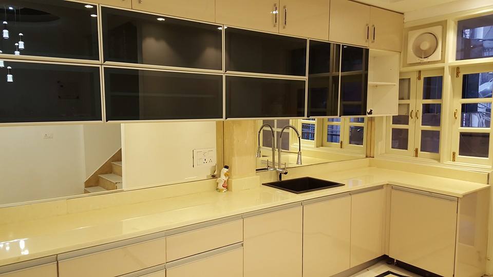 Luxurious L-shaped modular kitchen decor by Furnish Your Dream Modular-kitchen Modern | Interior Design Photos & Ideas