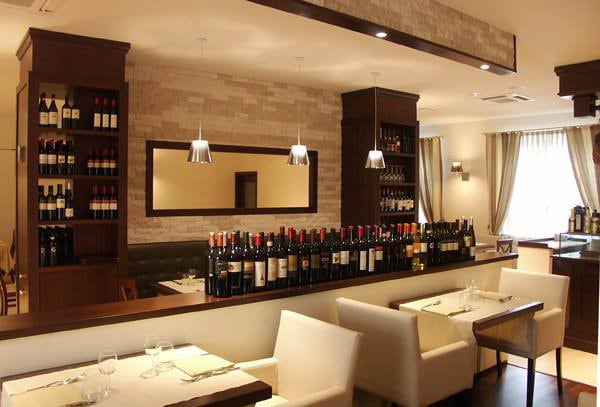 An elegant picture of the bar in a fine dining restauraunt by Bella Cucina Consultancy | Interior Design Photos & Ideas