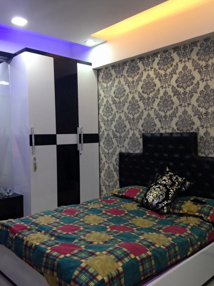 A standard guest bedroom with a creative wallpaper by Bella Cucina Consultancy Bedroom | Interior Design Photos & Ideas