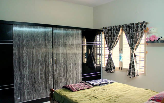 Bedroom With Wood Polish Wardrobe by Manusha Alapati Bedroom Modern | Interior Design Photos & Ideas