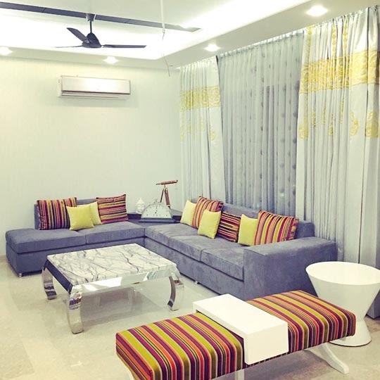 Gray Sofas With Multicolour Stripes Detailing by Shrey Modern | Interior Design Photos & Ideas