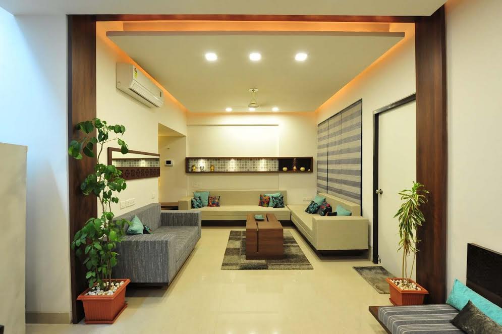 Spacious living room with white and grey sofas by GN Interiors Living-room Modern | Interior Design Photos & Ideas