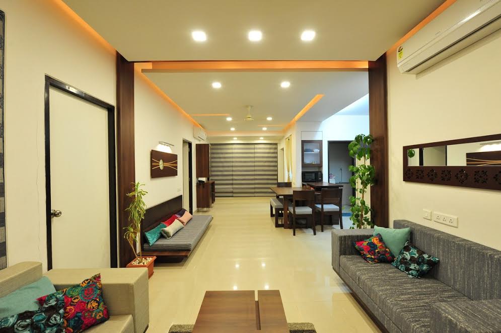 Spacious living room with grey sofas by GN Interiors Living-room Modern | Interior Design Photos & Ideas