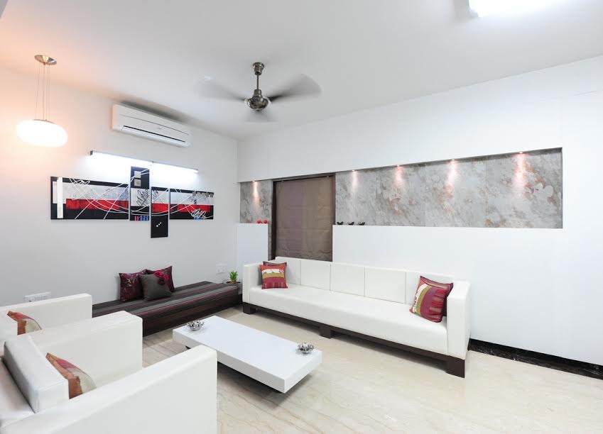 Spacious living room with white sofas by GN Interiors Living-room Modern | Interior Design Photos & Ideas