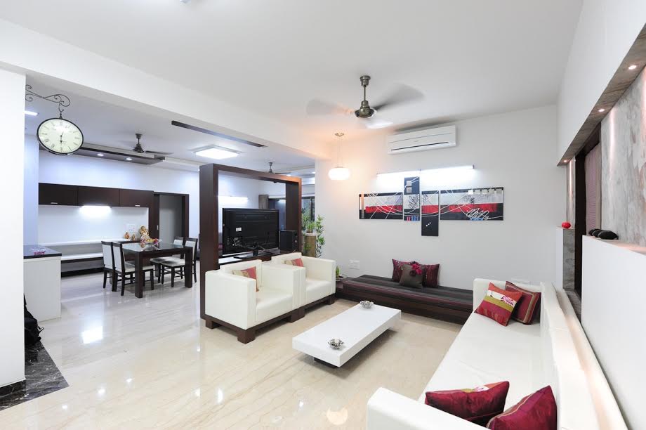 Spacious living room with white sofas by GN Interiors Living-room Modern | Interior Design Photos & Ideas
