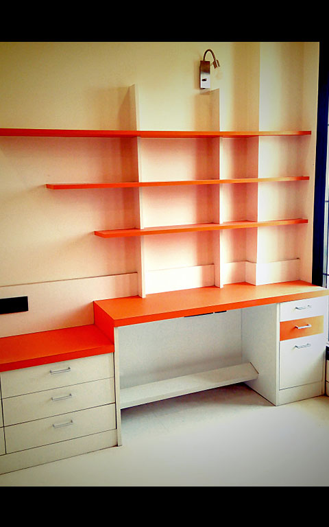 Study Room With Orange Detailing by Neeti Thakur