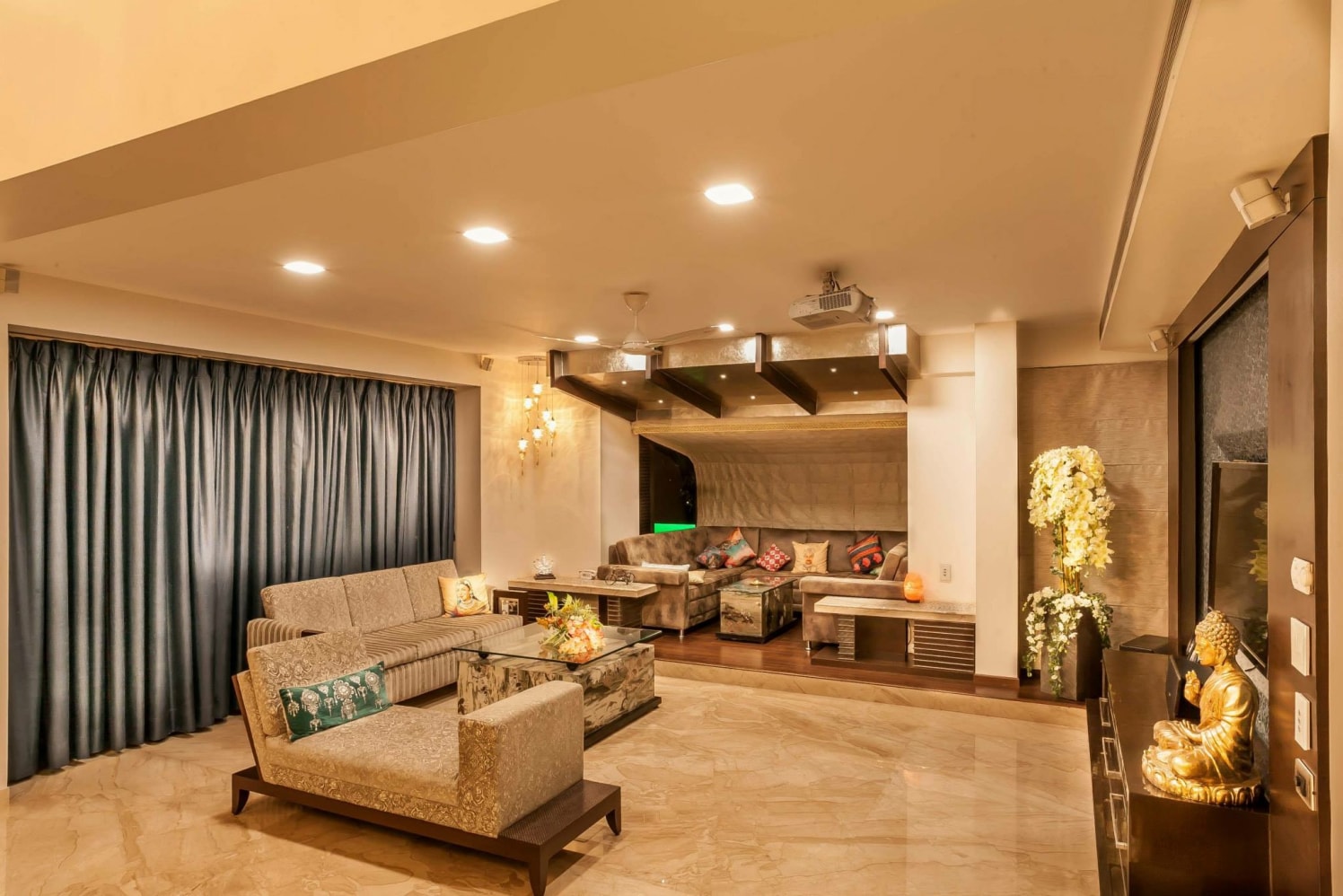 Regal gold theme living room decor by Blue Arch Interiors Living-room | Interior Design Photos & Ideas