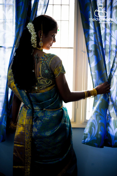 A exquisite portrait of the bride standing by the window by Media Mads Wedding-photography | Weddings Photos & Ideas