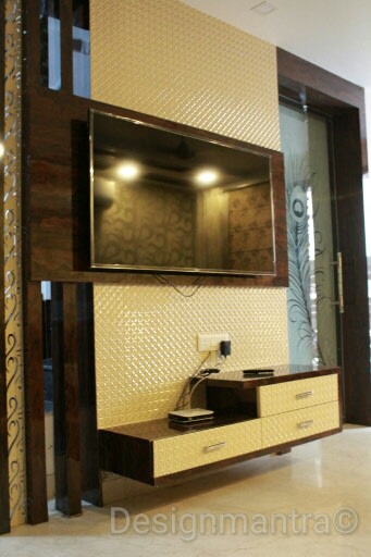 Plush TV cabinet decor by Designmantra Living-room | Interior Design Photos & Ideas