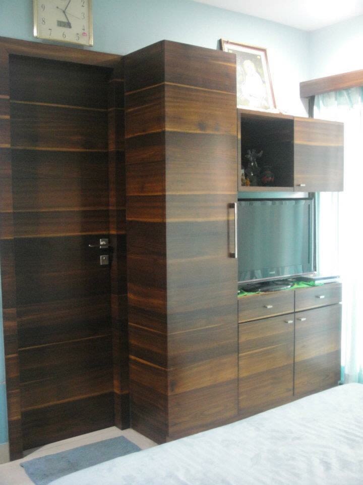 Wood finish TV cabinet decor by Amish Rathod Living-room Modern | Interior Design Photos & Ideas