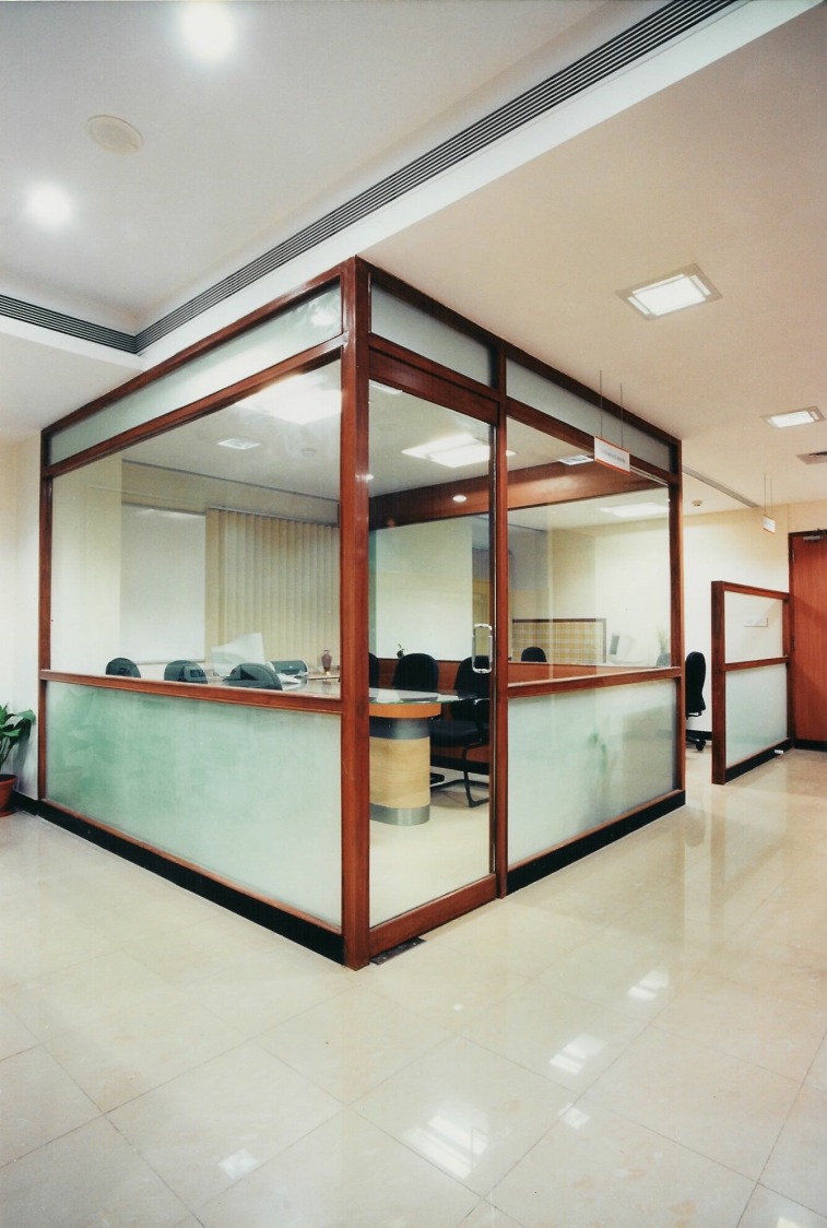 Glass Cabin Office Room With Wooden Frame by Amish Rathod Modern | Interior Design Photos & Ideas