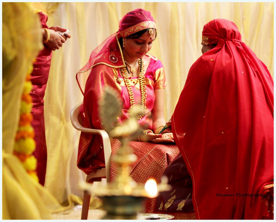 Bride during her mehendi ceremony by Naveen Photography Wedding-photography | Weddings Photos & Ideas