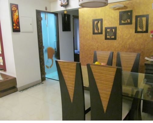 Wood finish dining room decor by Shrishti Dining-room Modern | Interior Design Photos & Ideas
