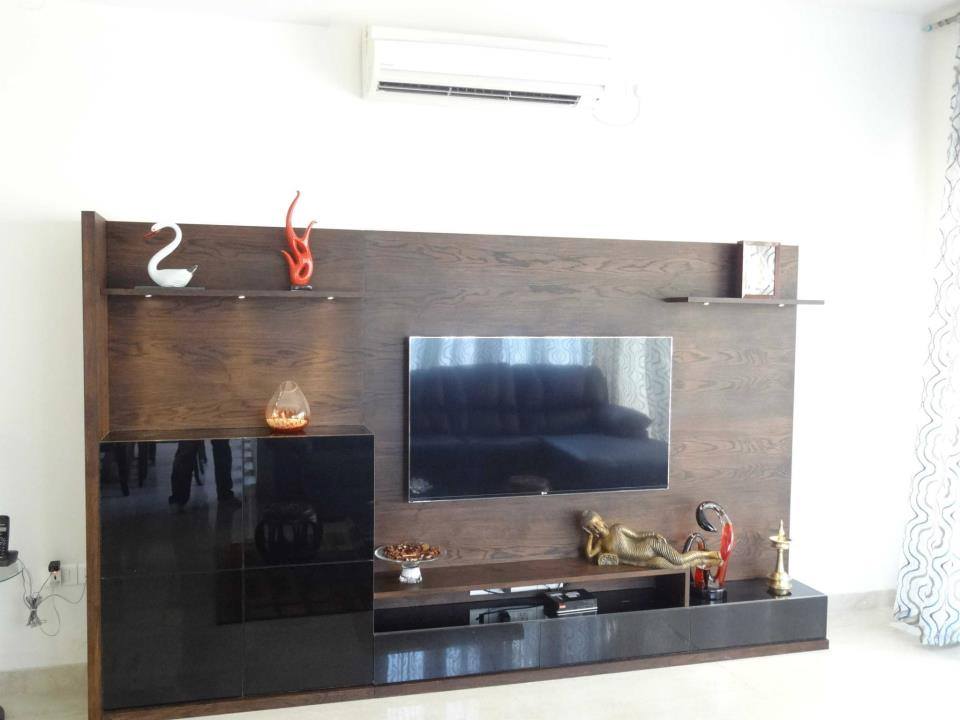 Wooden Television Cabinet With Leaning Golden Buddha by Snigdha Ghosh Living-room Contemporary | Interior Design Photos & Ideas