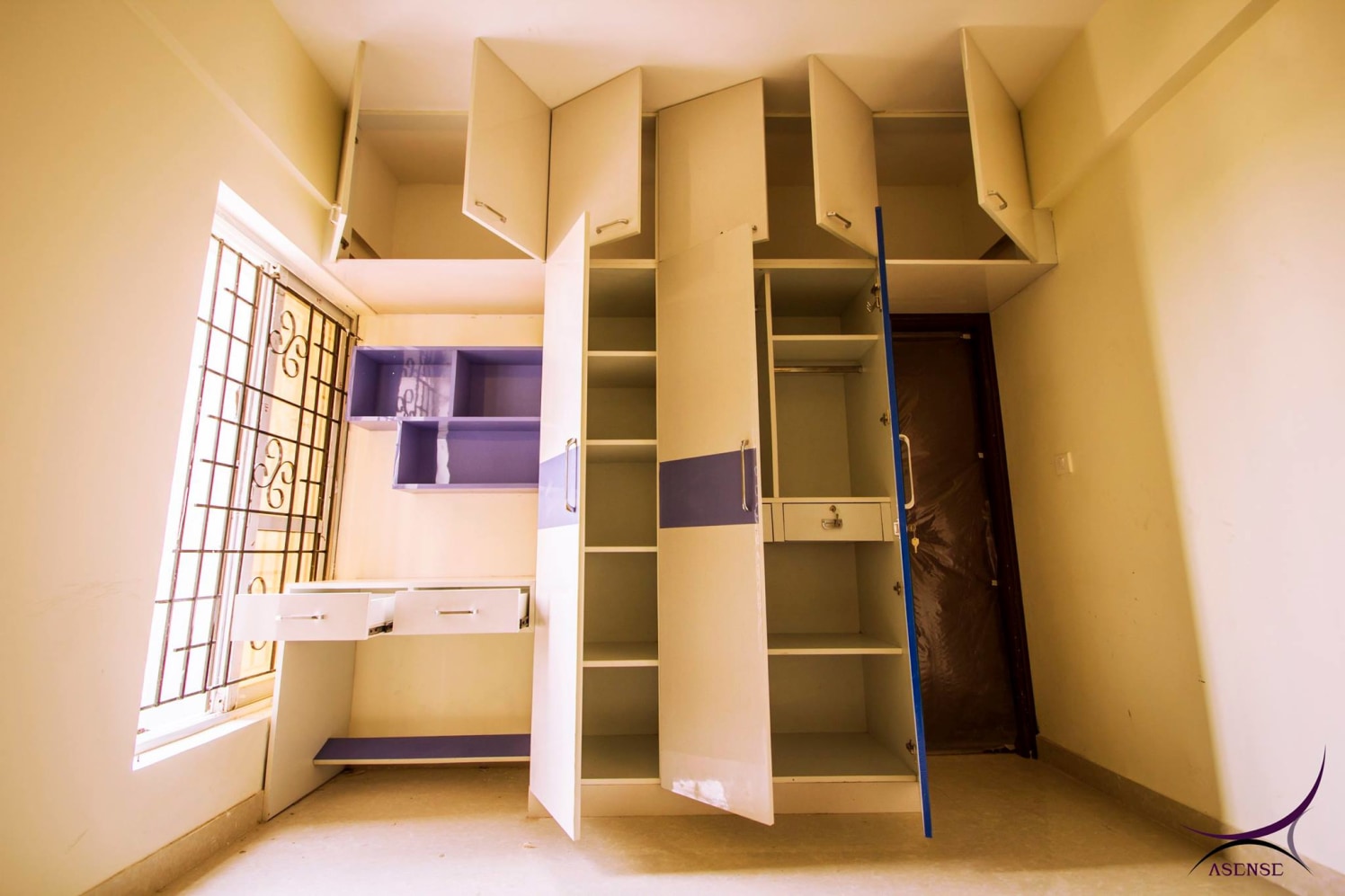 The cabinets in bedroom by Asense Interior