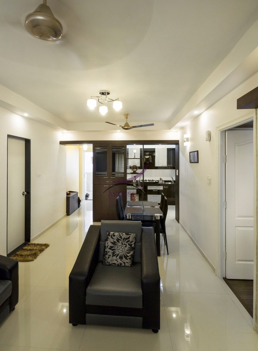 White Themed Living Room With Black Tub Chair by Snigdha Ghosh Living-room Contemporary | Interior Design Photos & Ideas