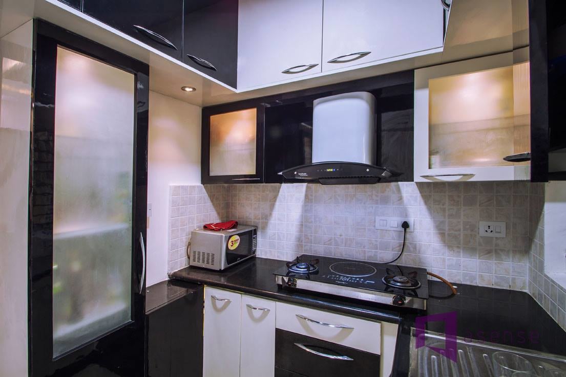 Black And White Themed Kitchen by Snigdha Ghosh Modular-kitchen Modern | Interior Design Photos & Ideas