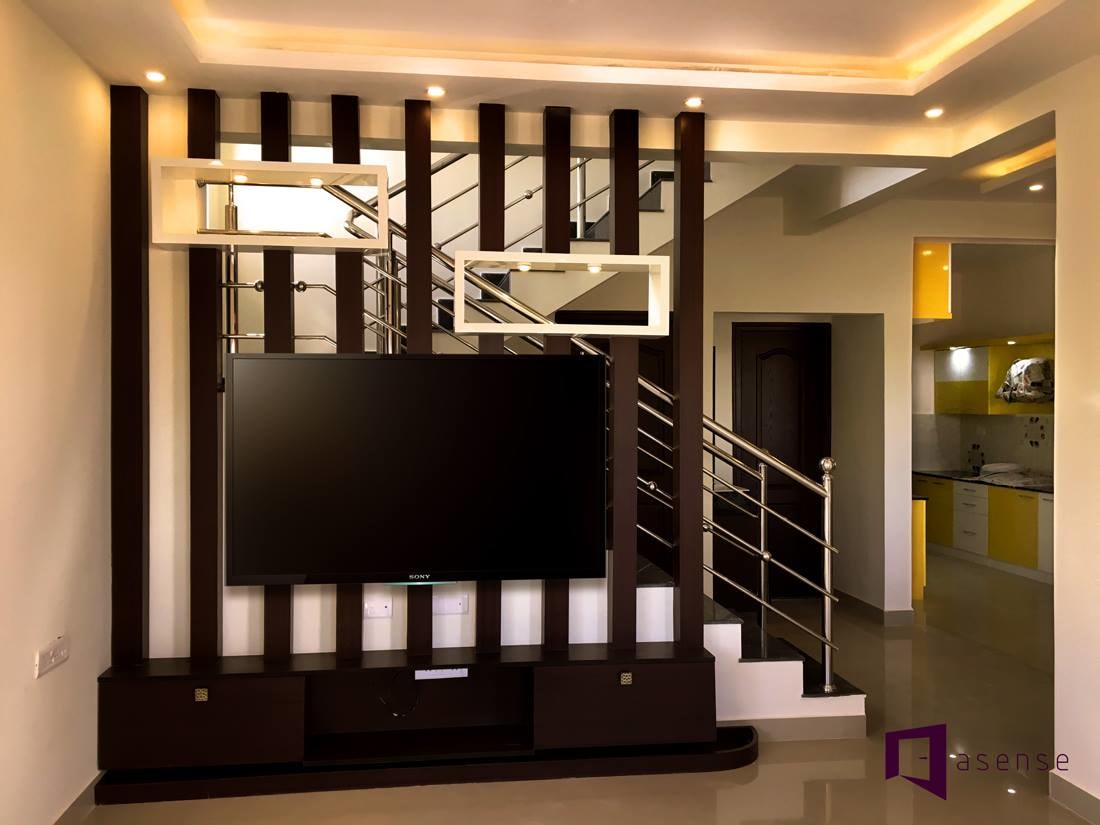 Simple Staircase With Metallic Railings by Snigdha Ghosh Indoor-spaces | Interior Design Photos & Ideas