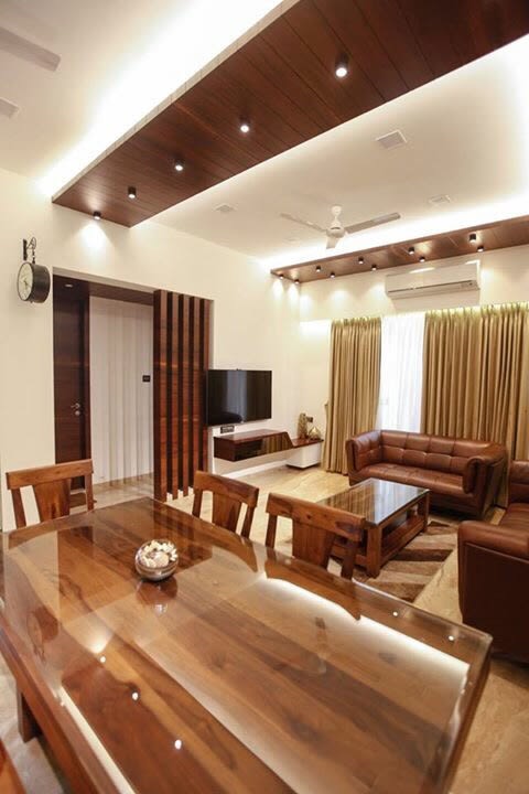 Wood finish living room decor by Artistic Illusions Living-room Modern | Interior Design Photos & Ideas