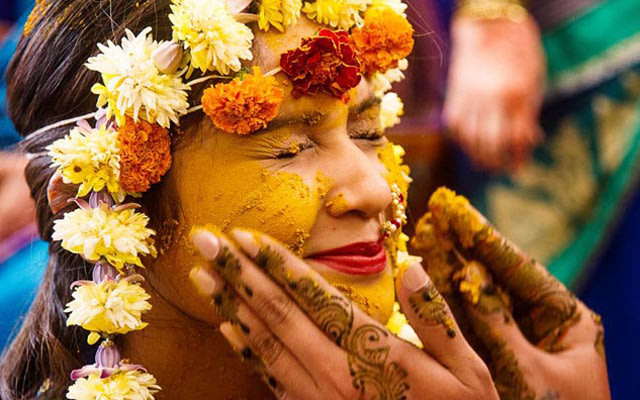 A Haldi Shot full of love by Flgroe Studios Wedding-photography | Weddings Photos & Ideas