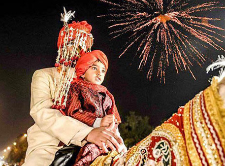 The groom riding on the horse with his young relative by Creative Films Photography and Events Wedding-photography | Weddings Photos & Ideas