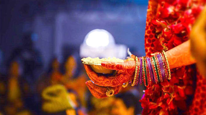 The bride indulging in the wedding customs by Creative Films Photography and Events Wedding-photography | Weddings Photos & Ideas