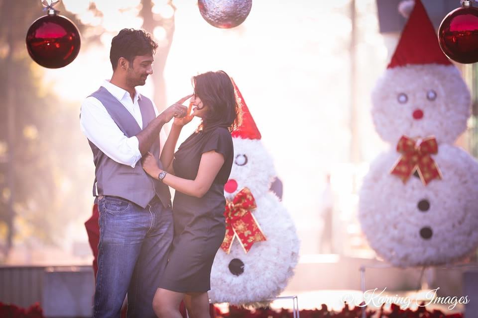 Bride and Groom To-Be Against White Christmas Setting by Priyanka Wedding-photography | Weddings Photos & Ideas