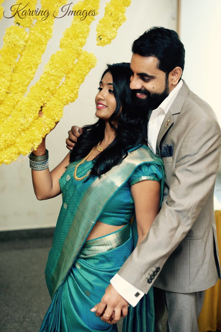 Elegant groom and bride pose with floral decor by Karving Images Wedding-photography | Weddings Photos & Ideas