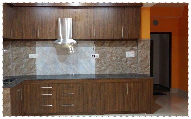 Wood finish L-shaped modular kitchen by Living Art Interiors Modular-kitchen Modern | Interior Design Photos & Ideas