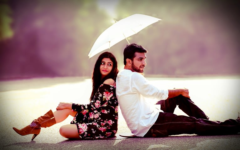 Bride and Groom To-Be Pose With an Umbrella by Himanshu Chauhan Wedding-photography | Weddings Photos & Ideas