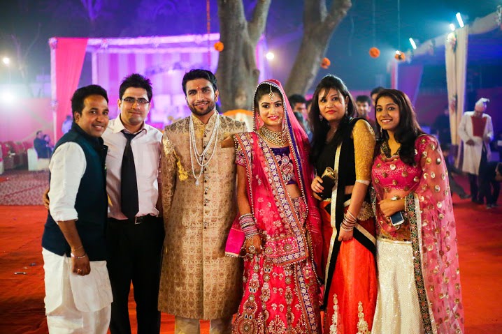 Bride and Groom Posing With Their Friends by Himanshu Chauhan Wedding-photography | Weddings Photos & Ideas