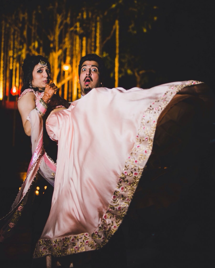 Bride and Groom Strike a Funny Pose by Amanpreet Kaur Wedding-photography | Weddings Photos & Ideas