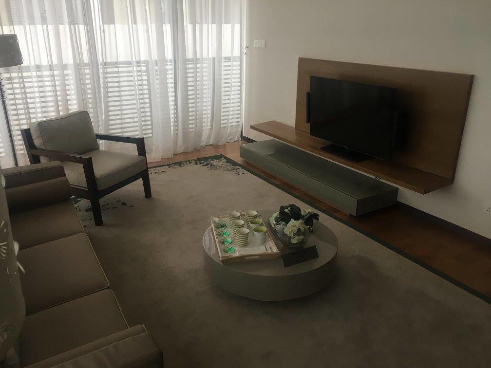 Beige themed Living Area With Tv Cabinet by Craftmen Studio Living-room Modern | Interior Design Photos & Ideas