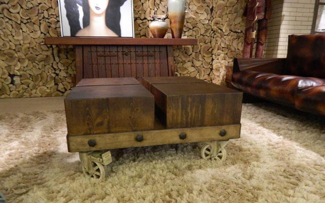 The wooden centre table with furry flooring by Aamantran Traditional | Interior Design Photos & Ideas