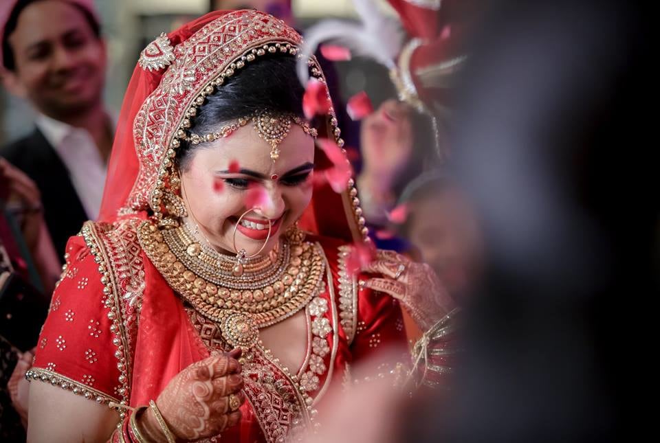 Captivating Glimpse Of Charismatic Bride Being Showered By Rode Petals by Paramjeet Singh Dhanjal Wedding-photography | Weddings Photos & Ideas