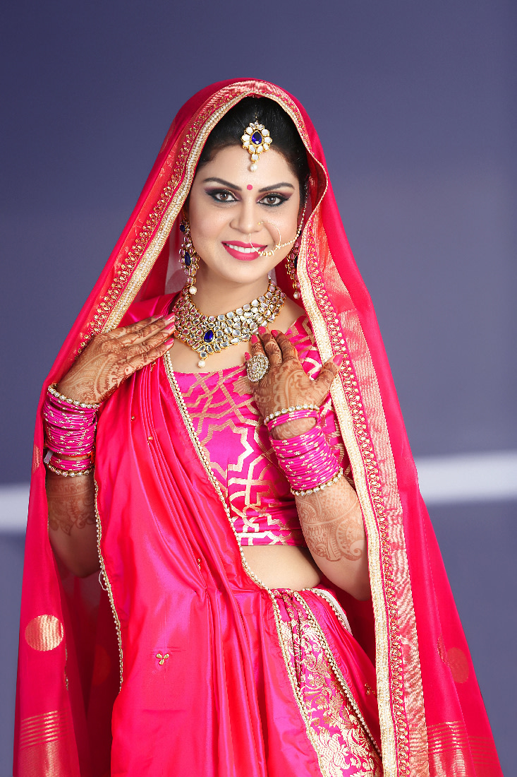 Glowing Bride Wearing A Magenta Lehenga by Mukesh bijalwan Wedding-photography Bridal-makeup Bridal-jewellery-and-accessories | Weddings Photos & Ideas