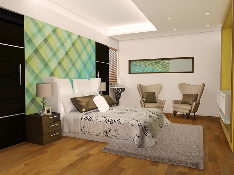 Spacious master bedroom with wooden flooring by Reform Design Bedroom | Interior Design Photos & Ideas