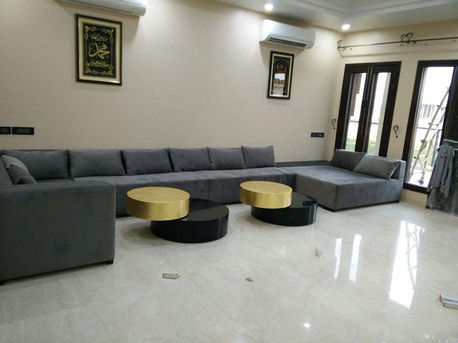 Contemporary living room with marble flooring by Reform Design Living-room | Interior Design Photos & Ideas
