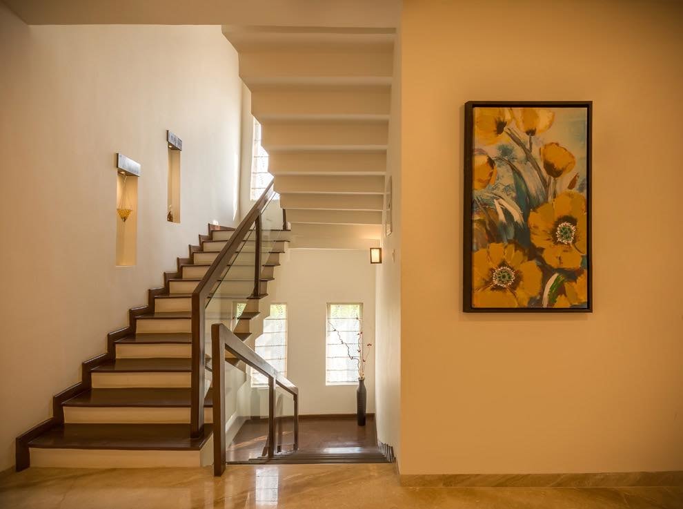 Wooden Staircase With Floral Wall Art by Nilesh Jain Indoor-spaces Contemporary | Interior Design Photos & Ideas