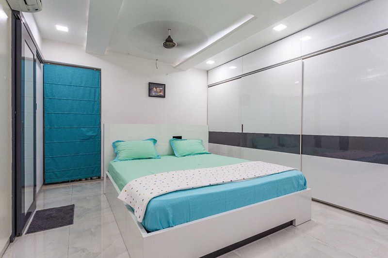 White Themed Bedroom With Shifting Wardrobe by Kraftworks Pvt. Ltd. Bedroom | Interior Design Photos & Ideas