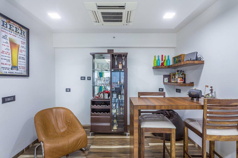 Wooden Table And Cushioned Chairs by Kraftworks Pvt. Ltd. Indoor-spaces | Interior Design Photos & Ideas