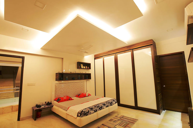 Cushioned Bed With Wooden Shifting Wardrobe by Nilesh Jain Bedroom Contemporary | Interior Design Photos & Ideas