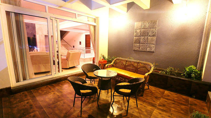 Balcony With Wooden Flooring And Jute Chairs by Kraftworks Pvt. Ltd. Open-spaces | Interior Design Photos & Ideas