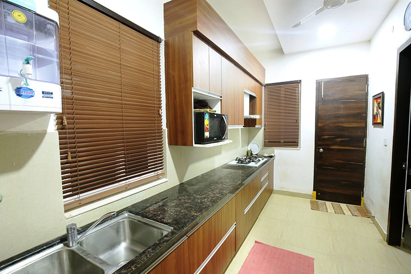 Parallel Wooden Kitchen by Kraftworks Pvt. Ltd. Modular-kitchen | Interior Design Photos & Ideas