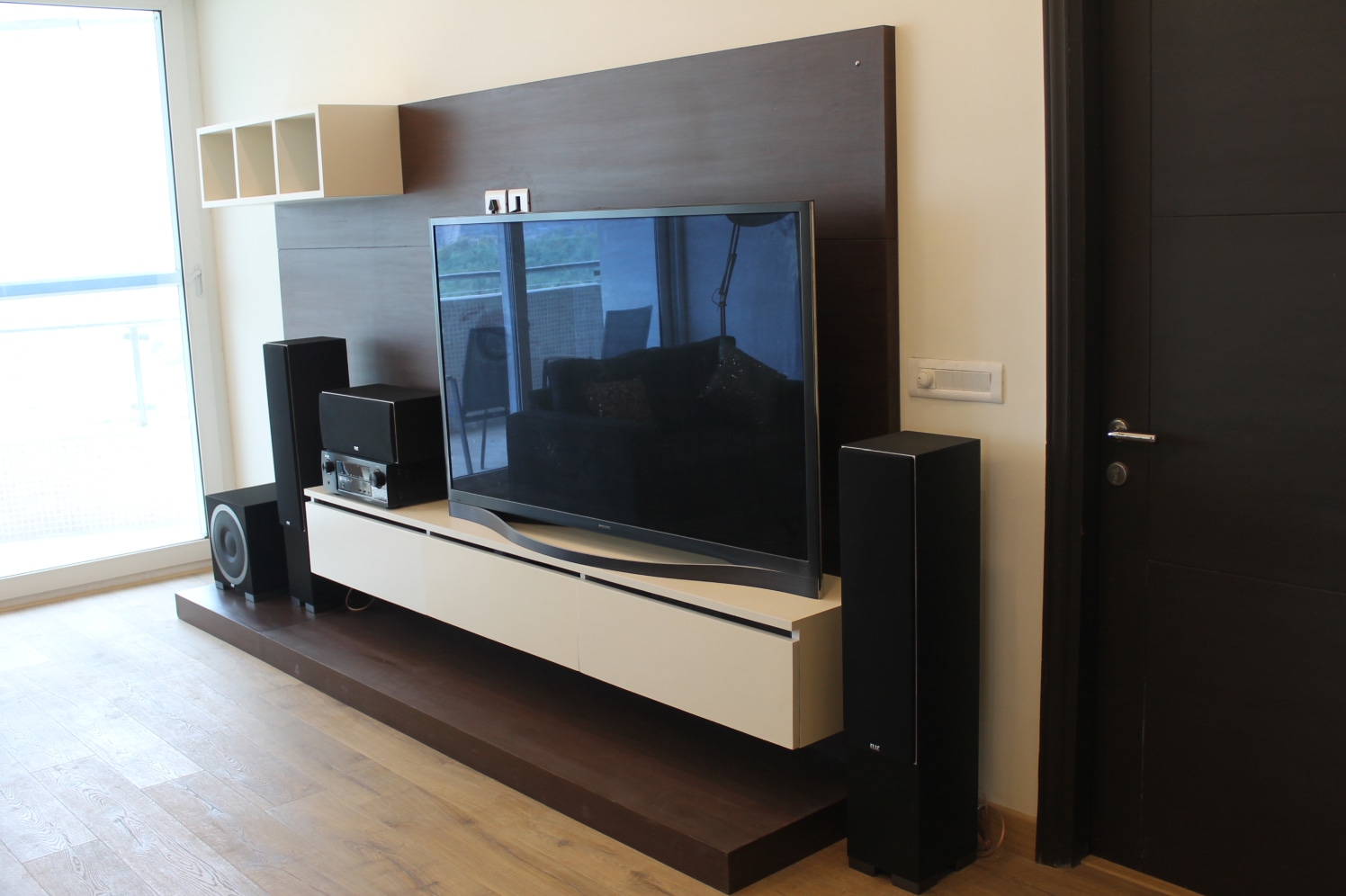 Living room with TV unit and wooden flooring by coalitiondesigns Living-room Modern | Interior Design Photos & Ideas