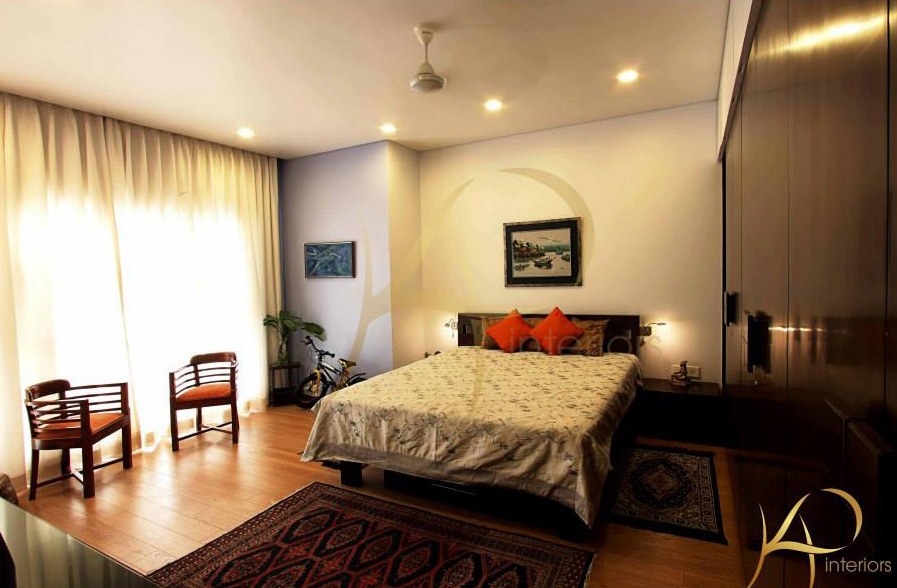 Bedroom With Orange Pillows by KP Interior Bedroom Contemporary | Interior Design Photos & Ideas